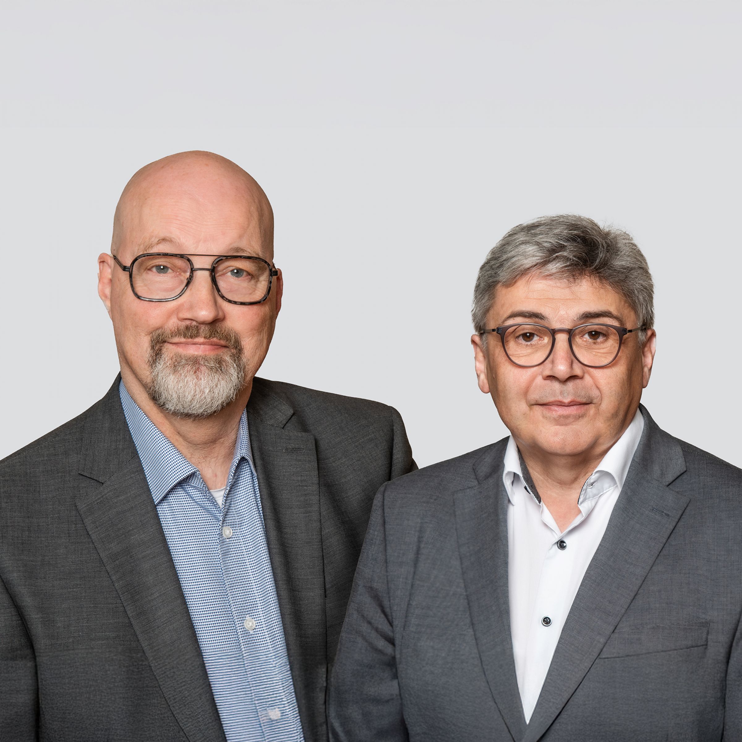 Portraitfoto des Vorstands Uwe M. Junga und Christian Voller-Morgenstern 
